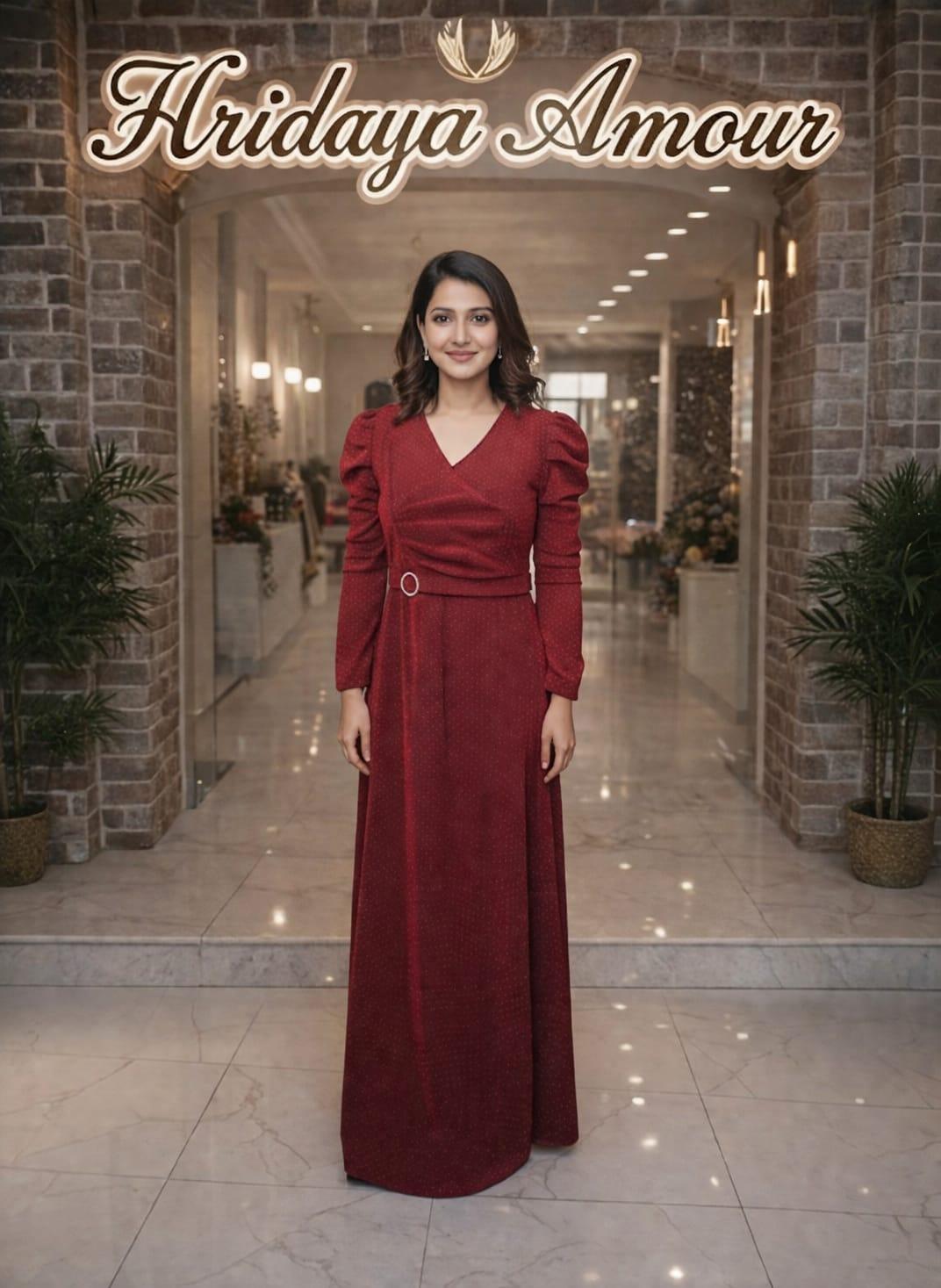 Model in a deep crimson column dress with crossover waist and puff sleeves